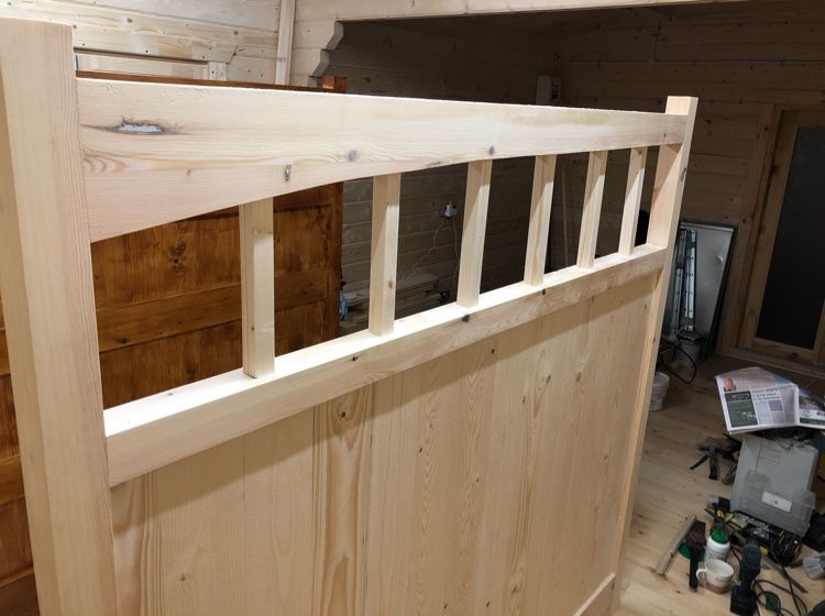 Wooden gate construction in workshop